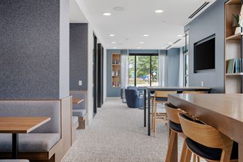 Coworking lounge with private meeting spaces